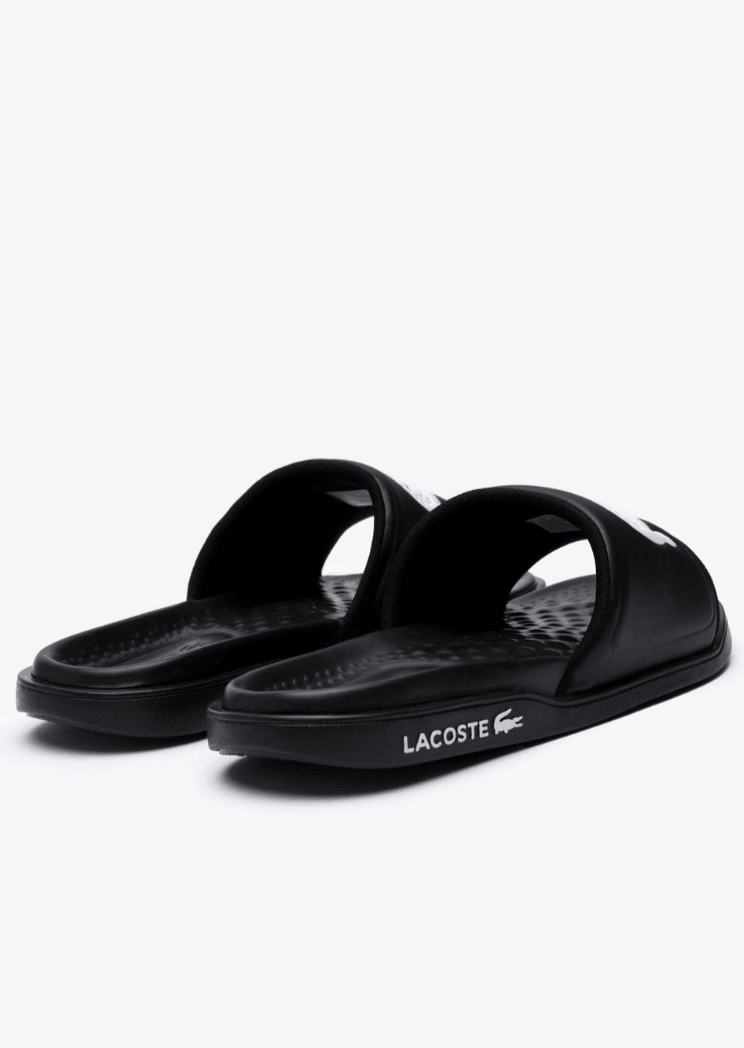 Claquettes Lacoste noires - French Destock