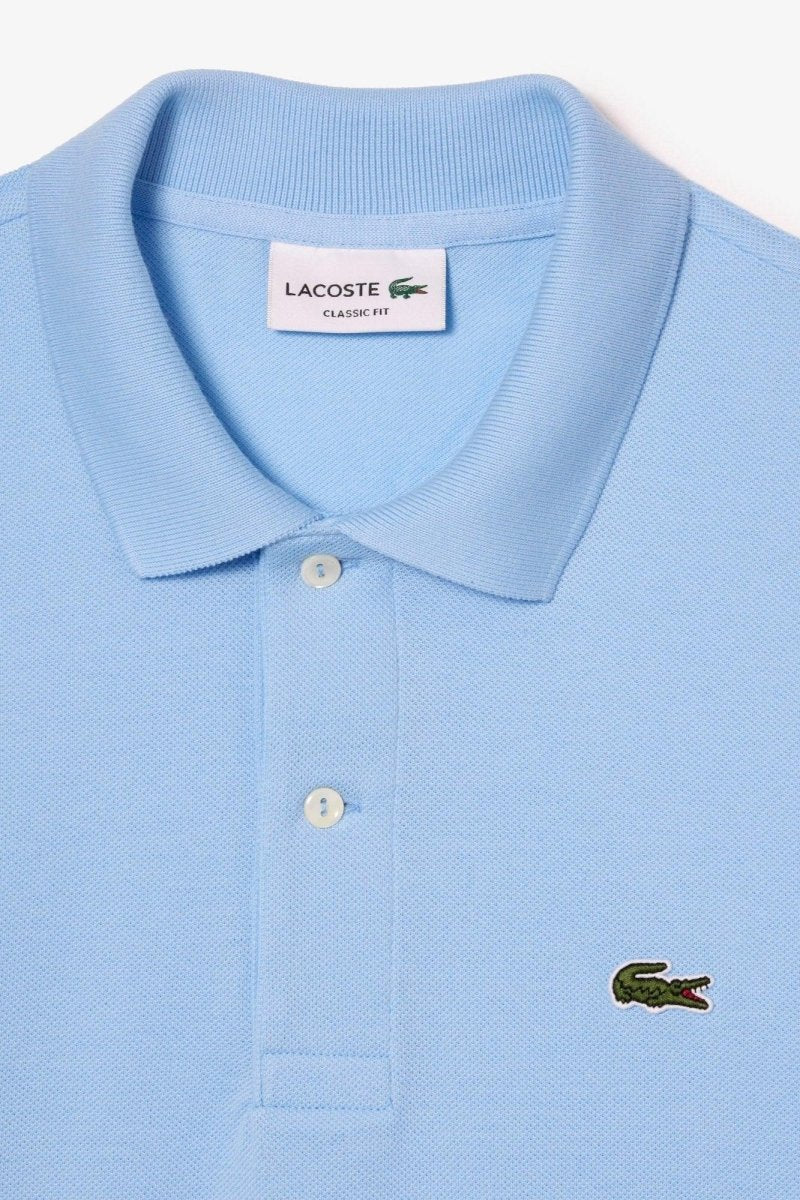 Polo manches longues Lacoste bleu - French Destock