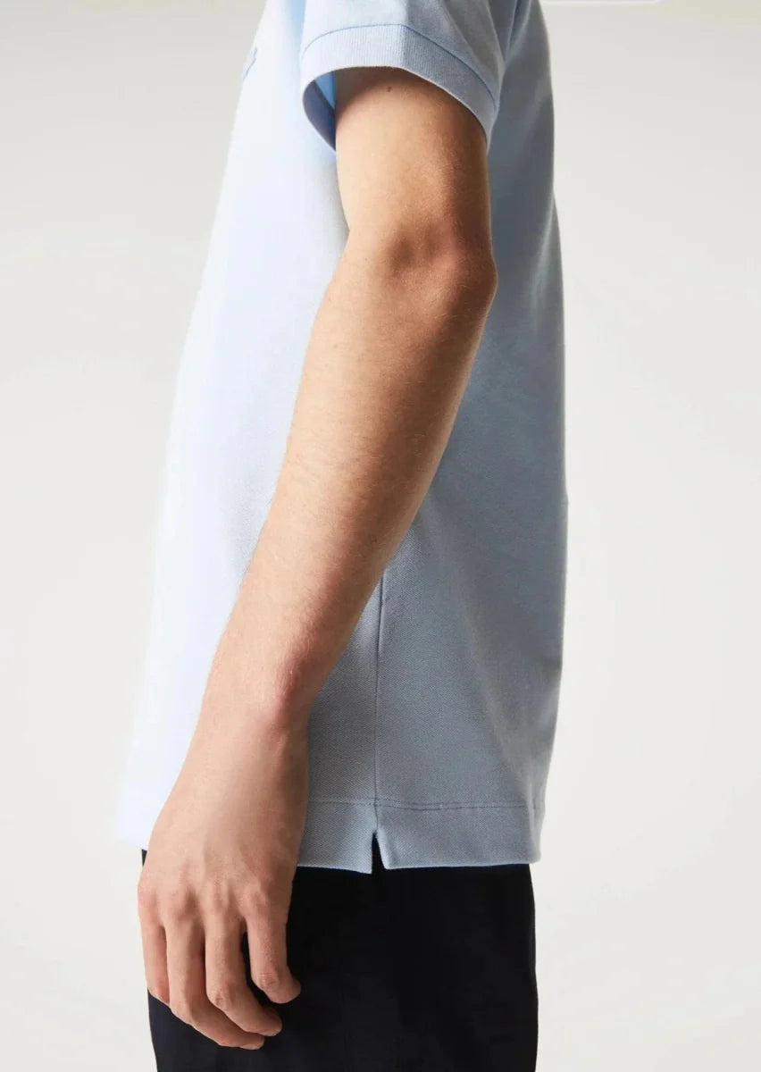 Polo Paris Lacoste bleu clair - French Destock