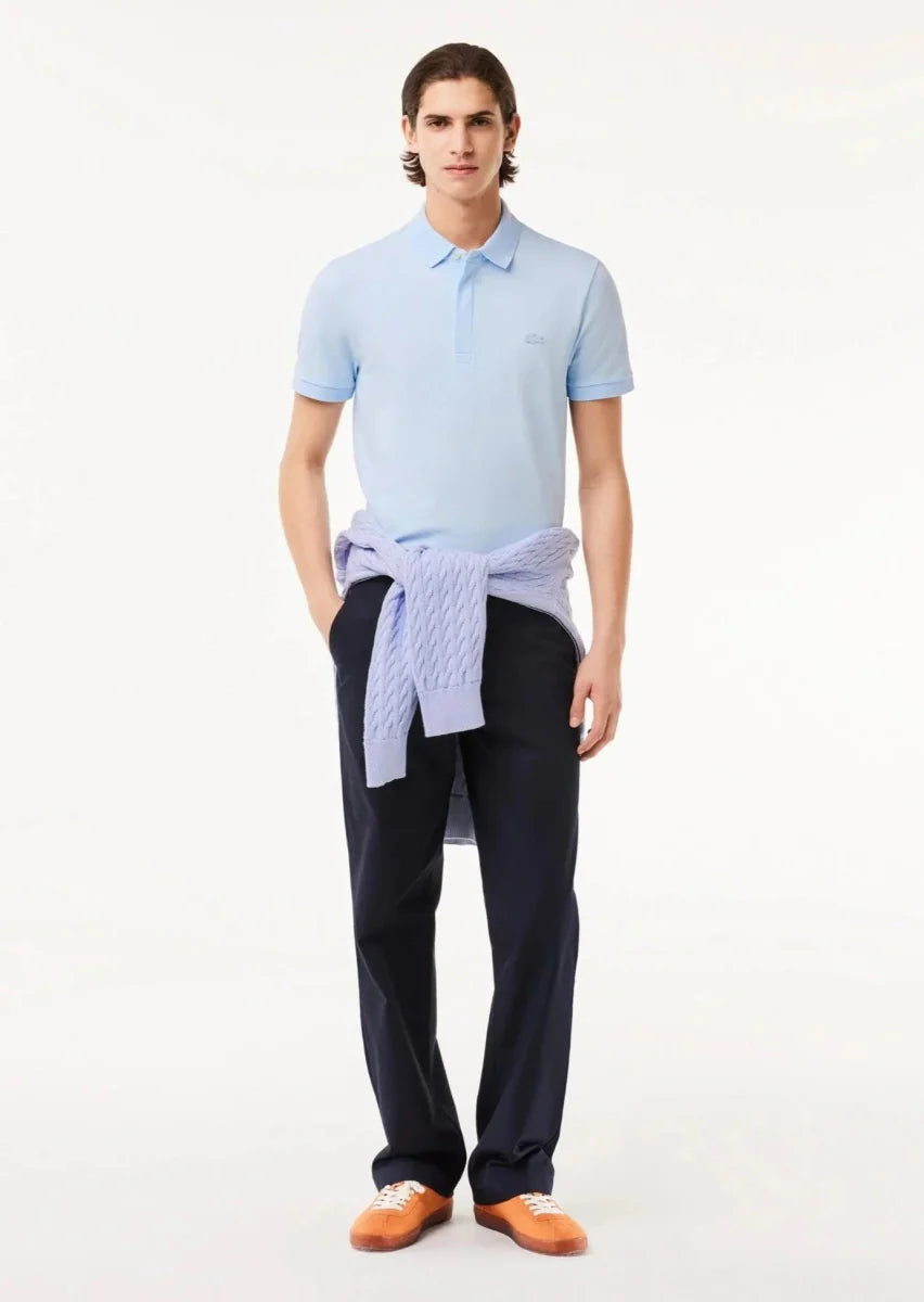 Polo Paris Lacoste bleu clair - French Destock