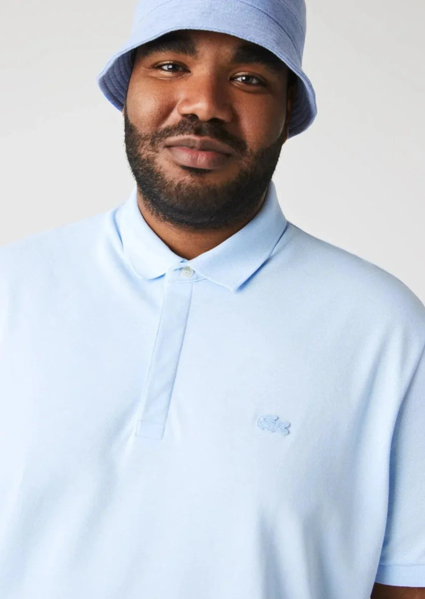 Polo Paris Lacoste bleu clair - French Destock