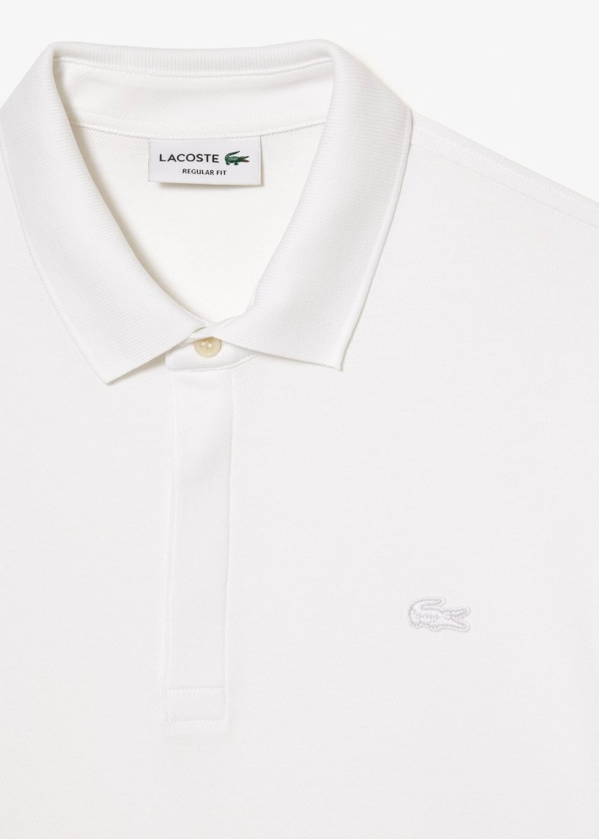 Polo Paris manches longues Lacoste blanc - French Destock