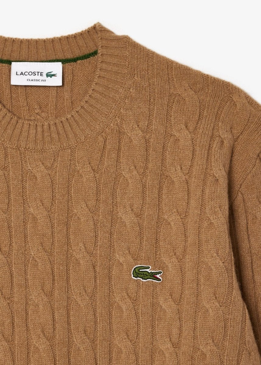 Pull torsadé Lacoste beige en laine - French Destock