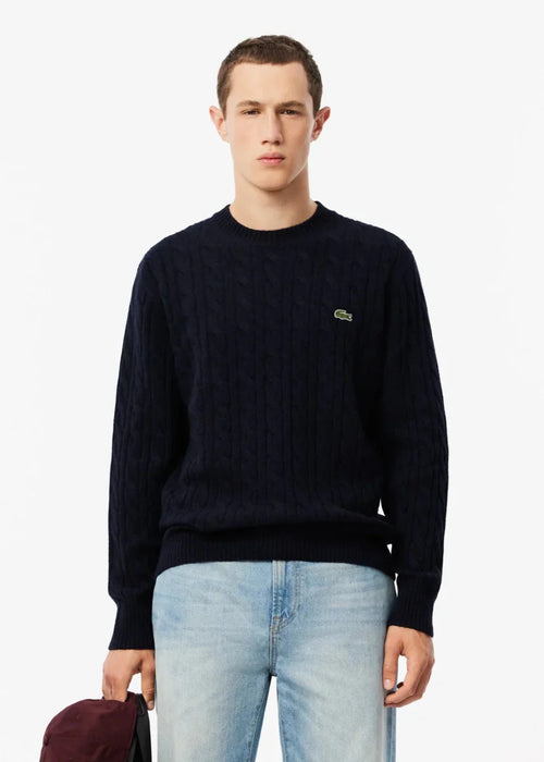 Pull torsadé Lacoste marine en laine - French Destock