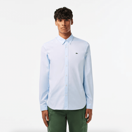 Chemise unie Lacoste ajustée bleu clair - French Destock
