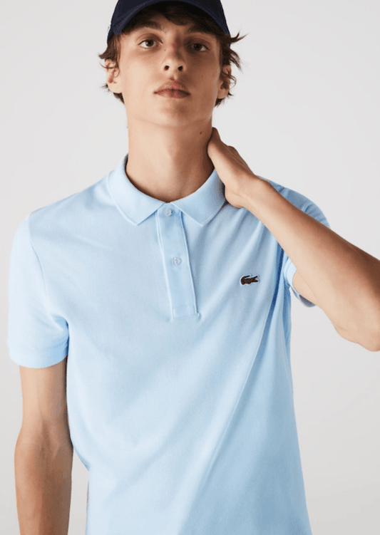 Polo Lacoste ajusté bleu clair - French Destock
