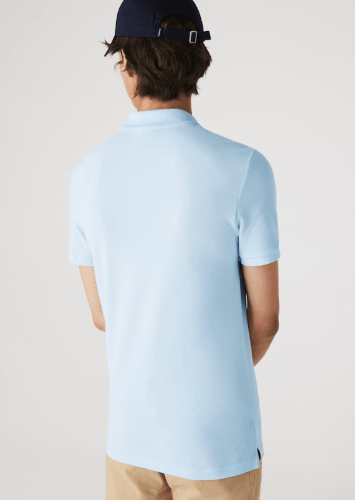 Polo Lacoste ajusté bleu clair - French Destock