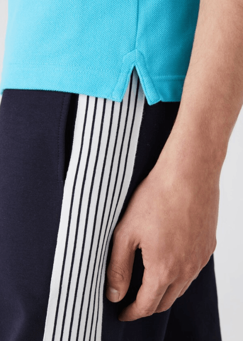 Polo Lacoste bleu - French Destock