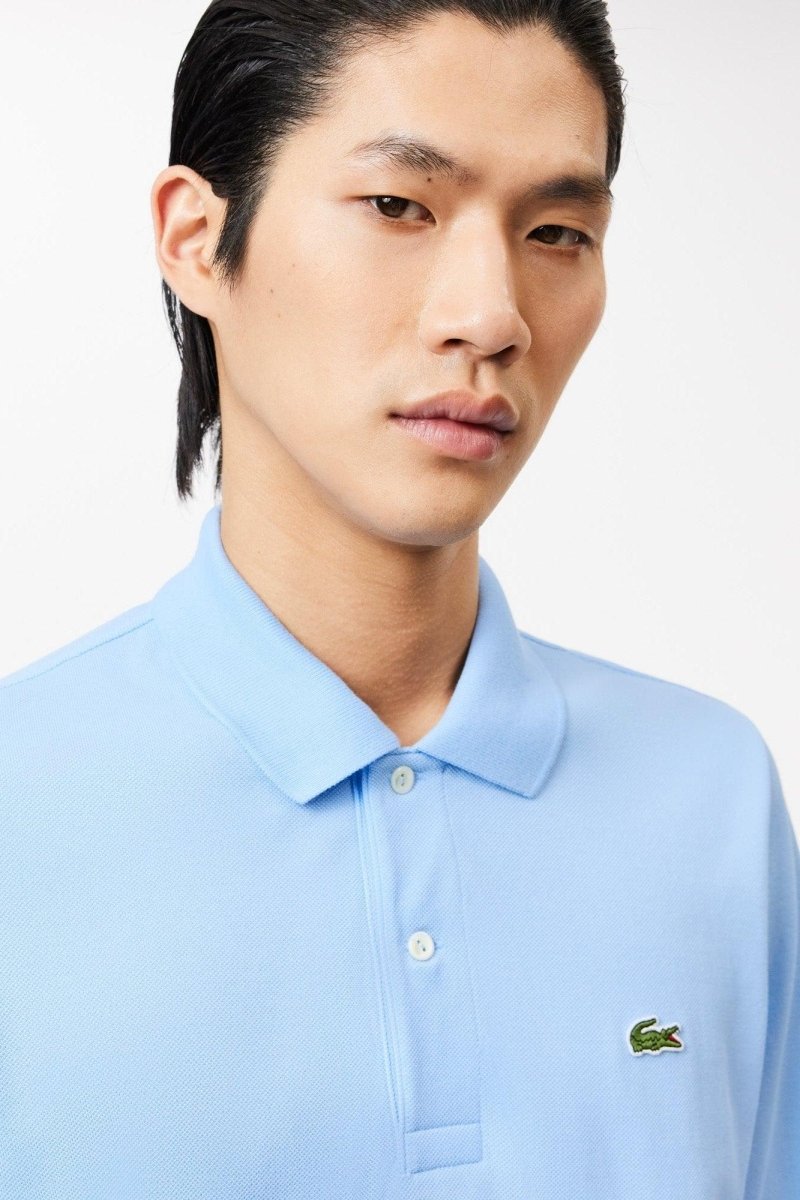 Polo manches longues Lacoste bleu - French Destock