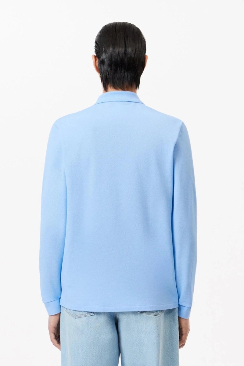 Polo manches longues Lacoste bleu - French Destock