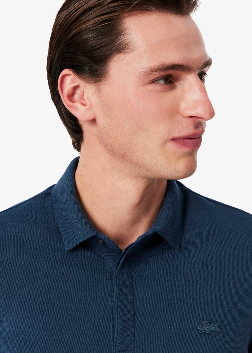 Polo Paris Lacoste bleu - French Destock