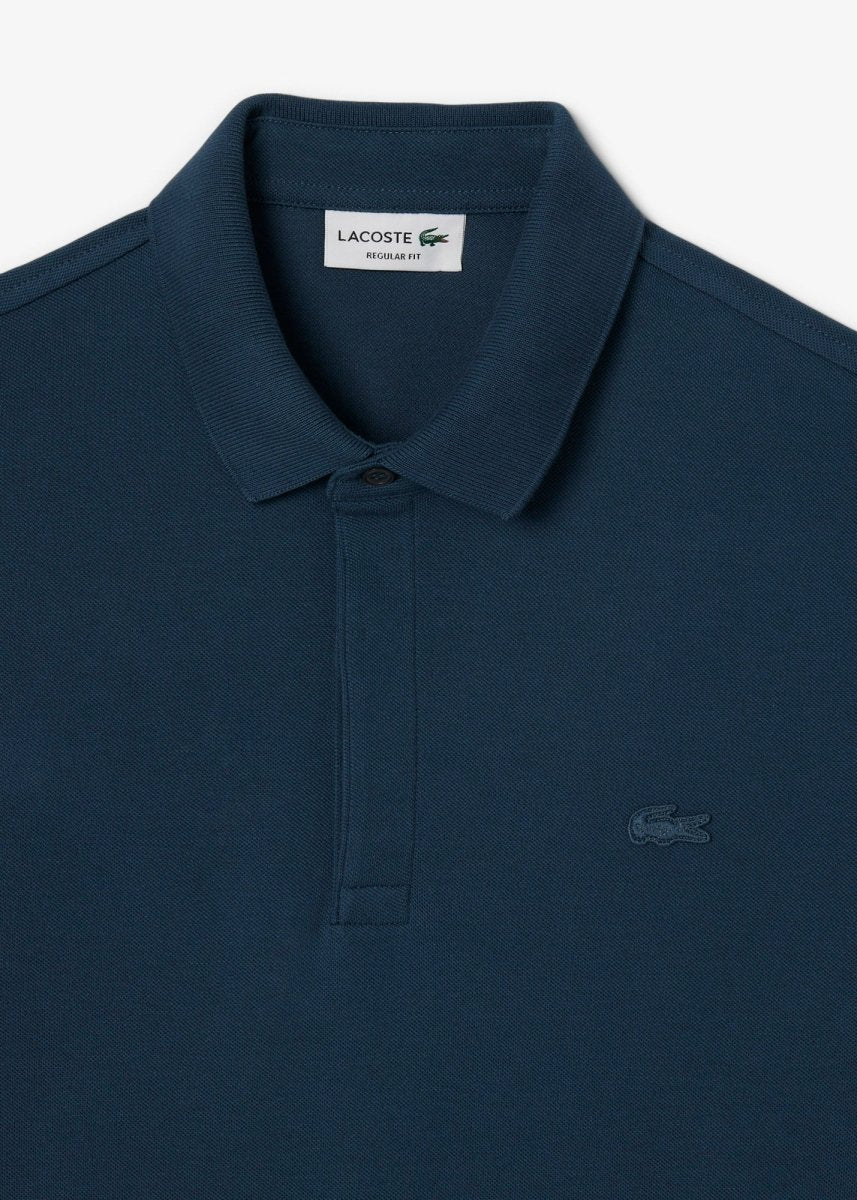 Polo Paris Lacoste bleu - French Destock