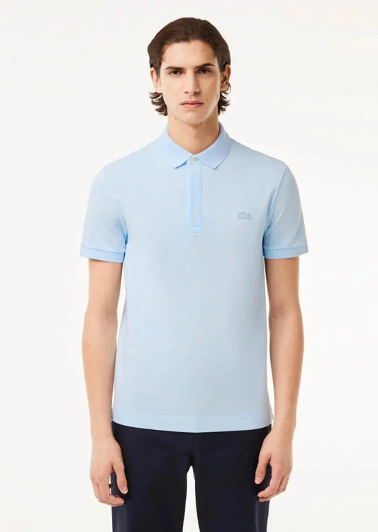 Polo Paris Lacoste bleu clair - French Destock